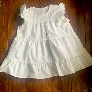 Cute white shirt.  Never been worn